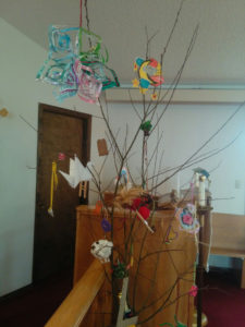 Jesse Tree decorated with symbols portraying the spiritual heritage of Jesus.